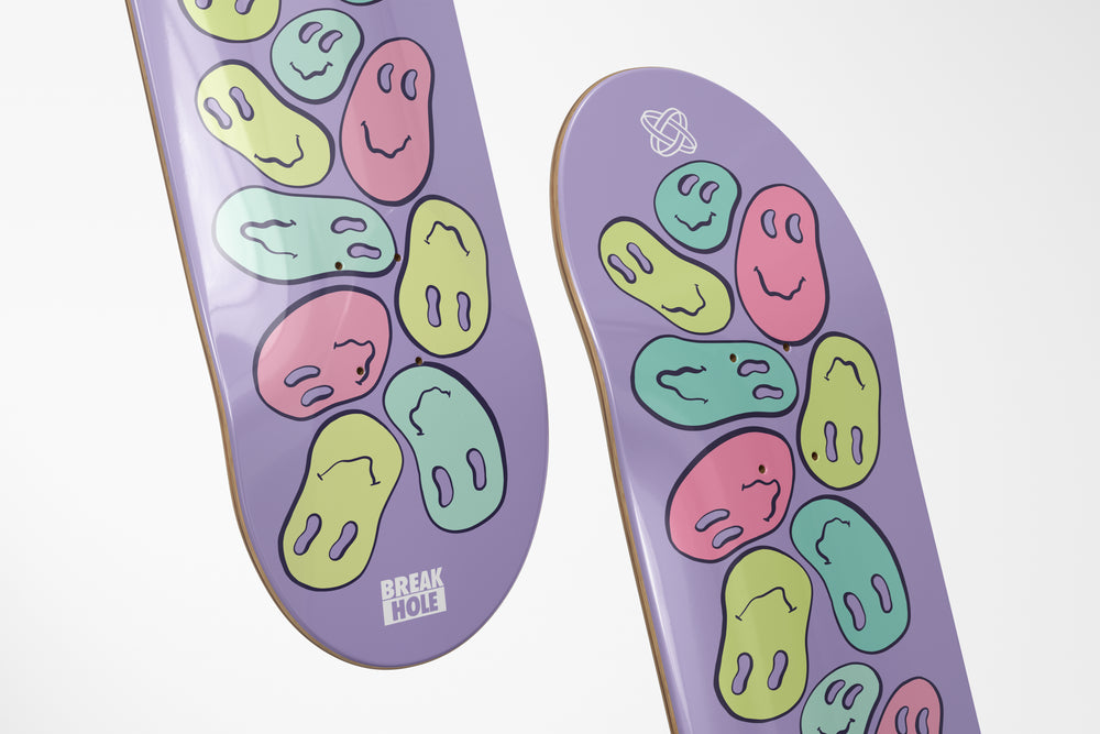 Purple skateboard deck adorned with numerous smiley faces