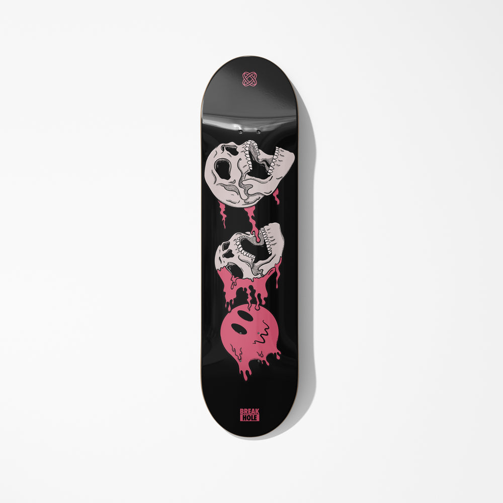 Black skateboard featuring a skull design