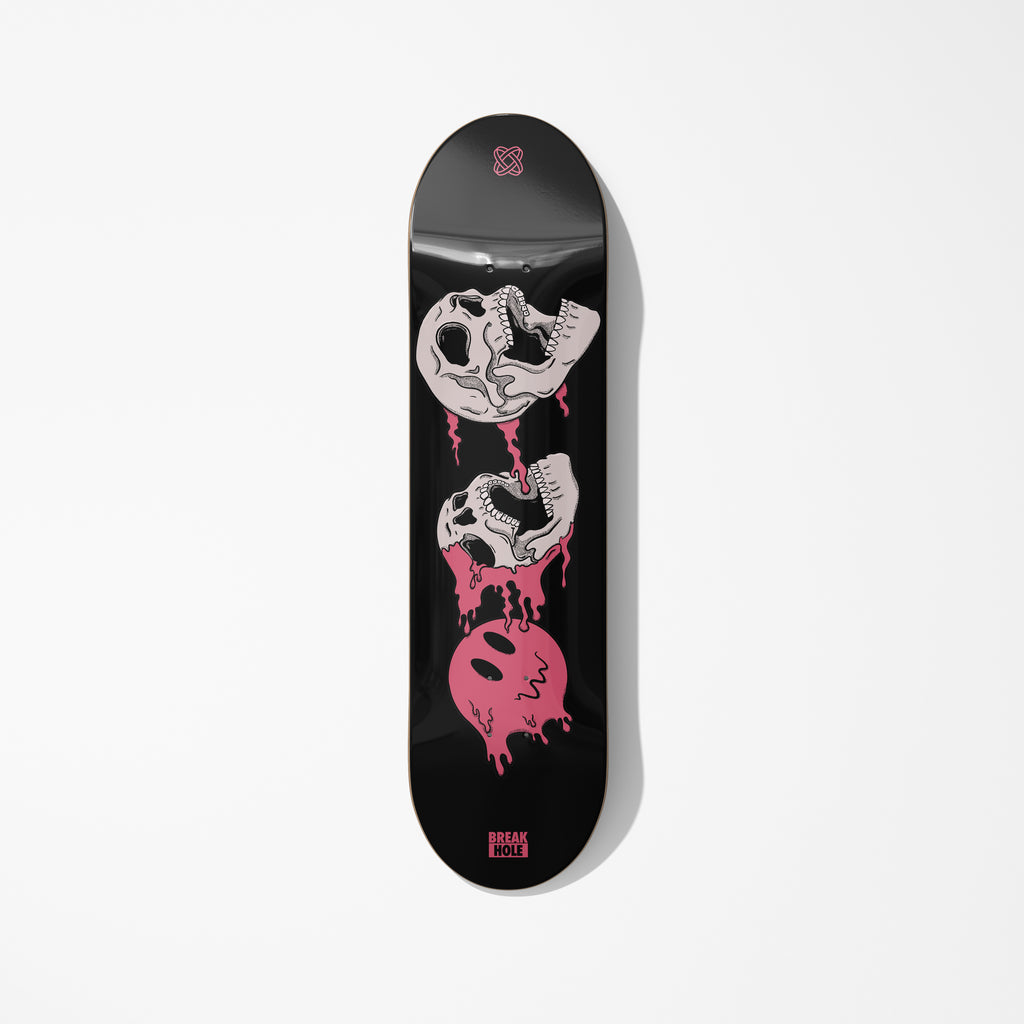 Black skateboard featuring a skull design